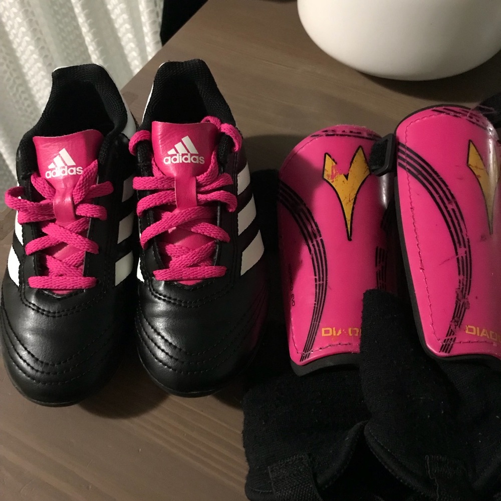 Adidas cleats and shin gaurds
